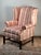This is a really classic Chippendale-style wingback chair by Ethan Allen, a maker well known for producing high-quality...