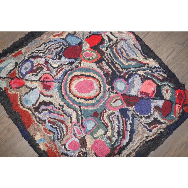 An early 20th-century American hooked small square rug