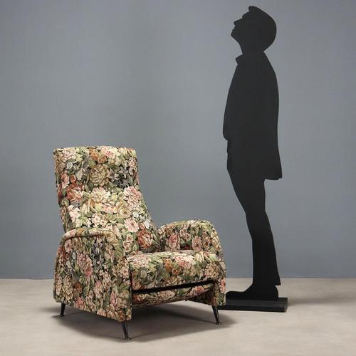 Armchair with adjustable backrest and footrest. Foam padding and fabric upholstery, enameled metal legs. This piece is...