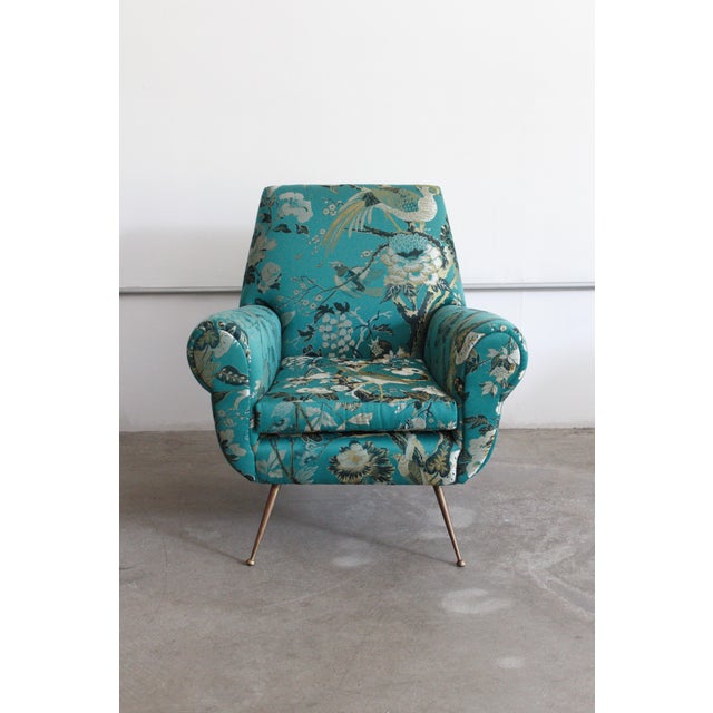 A mid century Italian armchair by Gigi Radice. Newly reupholstered in Dedar Milano Silkbird jacquard fabric. “A lampas...