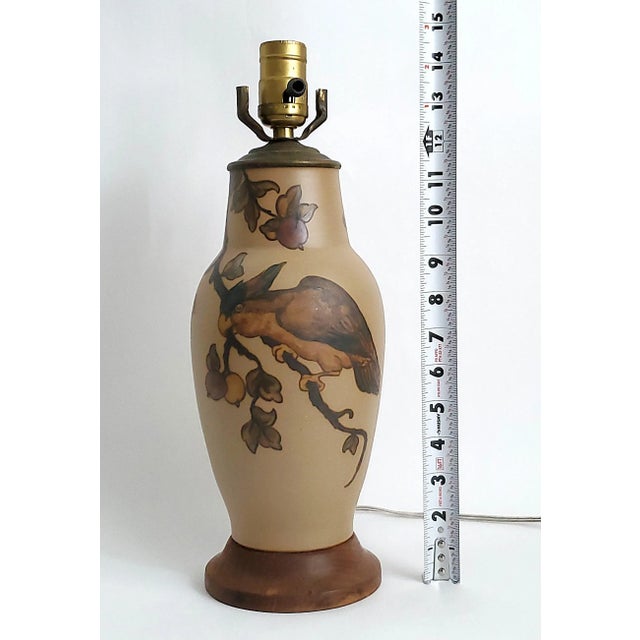 Offering a ceramic table lamp made by Lauritz Adolph Hjorth, Denmark 1930s. The body of the lamp is made from tan colored...