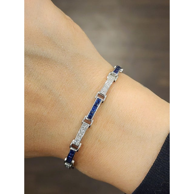 This elegant tennis bracelet embodies modern sophistication, meticulously designed to highlight its timeless beauty....