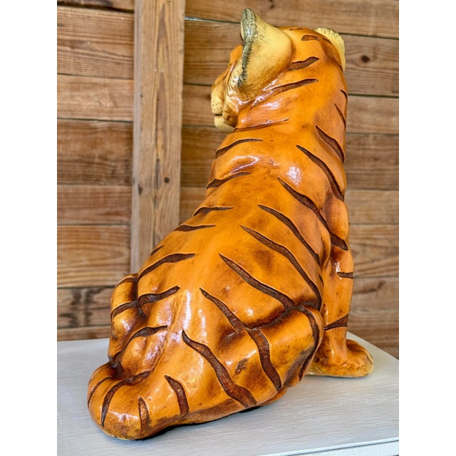 Striking Mid-20th Century cast resin tiger cub sculpture by Marwal, known for their lifelike animal figures and expressive...