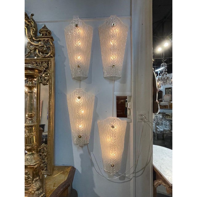 Beautiful pair of modern Murano glass sconces with textured glass. Very Fine quality and so pretty!! Note: There are...