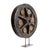 wooden wheel disposed on a foot of iron. This piece is designed in the style of the selected designer and/or manufacturer