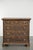 This beautiful, richly carved English oak chest of drawers dates from the 18th century and features unique details and a...