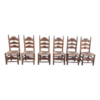 20th Century Set of Six Catalan Chairs in Carved Walnut and Caned Seats For Sale