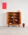 Dimensions: approx. 120 × 48 × 128 cm (width × depth × height) An exceptionally high-quality teak highboard, crafted by...