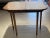Vintage American console table made of tree wood that can be open as a square table as well. Very good quality. The table...