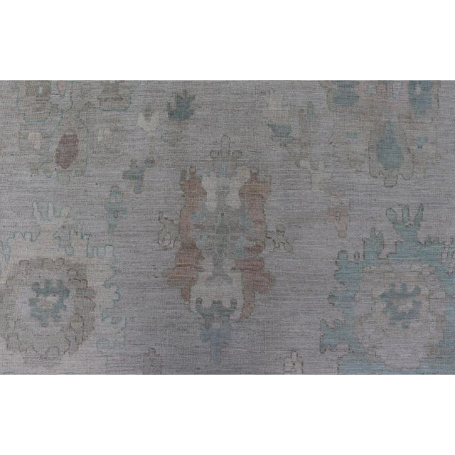 Modern All-Over Floral Oushak With Light Gray Background and Muted Colors For Sale - Image 4 of 12