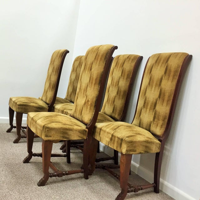 Set of fine original French modernist dining chairs. Tall backs with elegant cabriole front legs and tapered splay back...