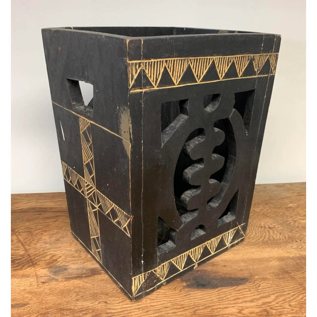 Unique solid wood carved small bin, perfect size for a wastebasket. Looks like it may have been made in Africa based its...