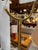 Elegant Italian floor lamp featuring a polished brass frame, sculptural curved arm, and faceted pedestal base. The height...