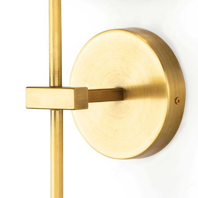 Sleek and simplistic are the Toni Sconce is a beautiful addition to a variety of different aesthetic spaces. A thin,...