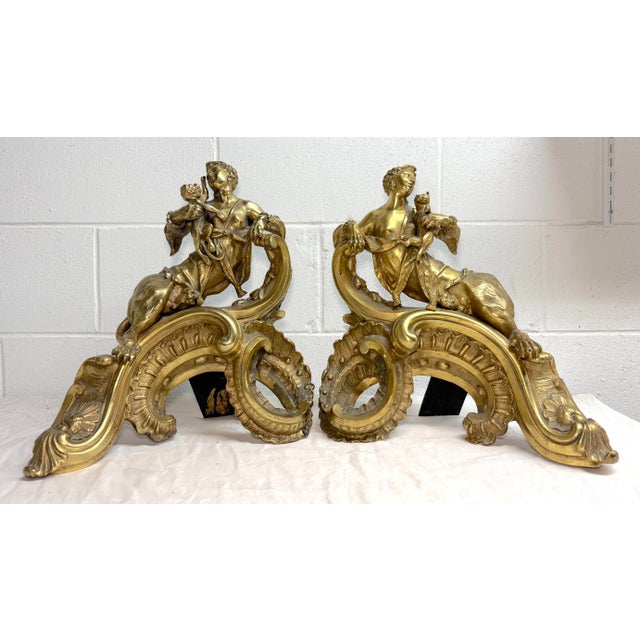 Up for sale is a pair of antique Louis XV style gilt bronze female Sphinx chenets. These ornate and extremely heavy...
