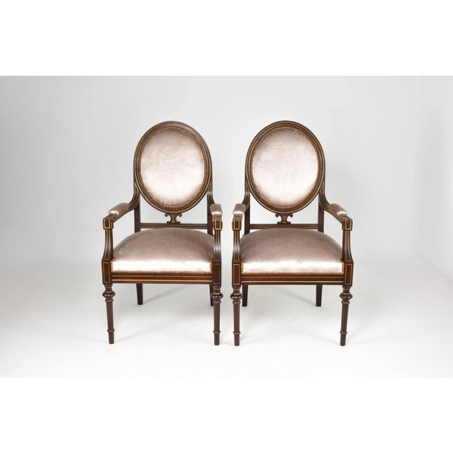 Introducing a pair of French Louis XVI-style chairs from the 1960s, restored by our atelier. These neoclassical armchairs...