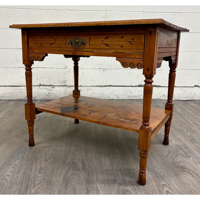 This is a gorgeous and rare antique Victorian Eastlake Aesthetic Movement late 19th Century walnut library table, console,...