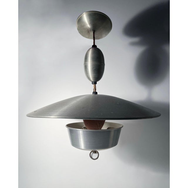 Very nice large scale Aluminum Pull Light Pendant. Nice composition of aluminum parts to create a nice overall form to...