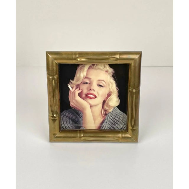 Squared picture frame in faux bamboo brass attributed to the Italian designer Tommaso Barbi. Made in Italy in the 1970s.