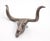 Reproduction Rustic style cast iron Texas longhorn steer skull drawer pull. A mounting screw is included. Good condition...