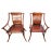 A Pair of Early 20th Century Chinese Elmwood Armchairs with finely carved back and elongated arms and legs. Measure 30"...