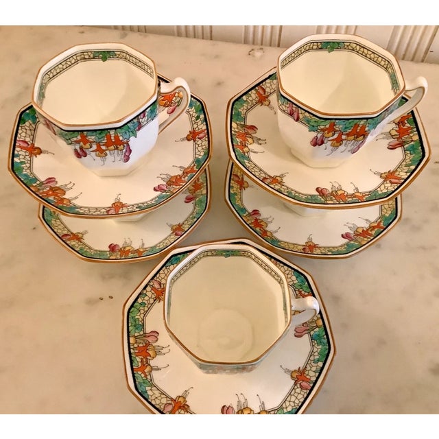 The ultimate matching companions to the sold-out bread plates – a pristine set of eight Royal Doulton “Fuchsia” coffee/tea...