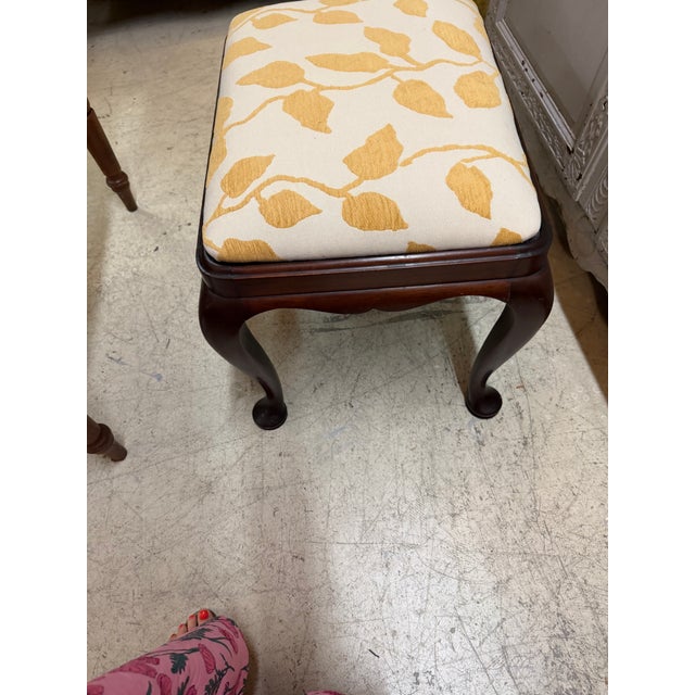 Sienna Vintage Queen Anne Style Footstool Features Dark Wood Cabriole Legs With Pad Feet and an Off-White Cushion Upholstered in a Yellow Leaf Pattern For Sale - Image 8 of 8