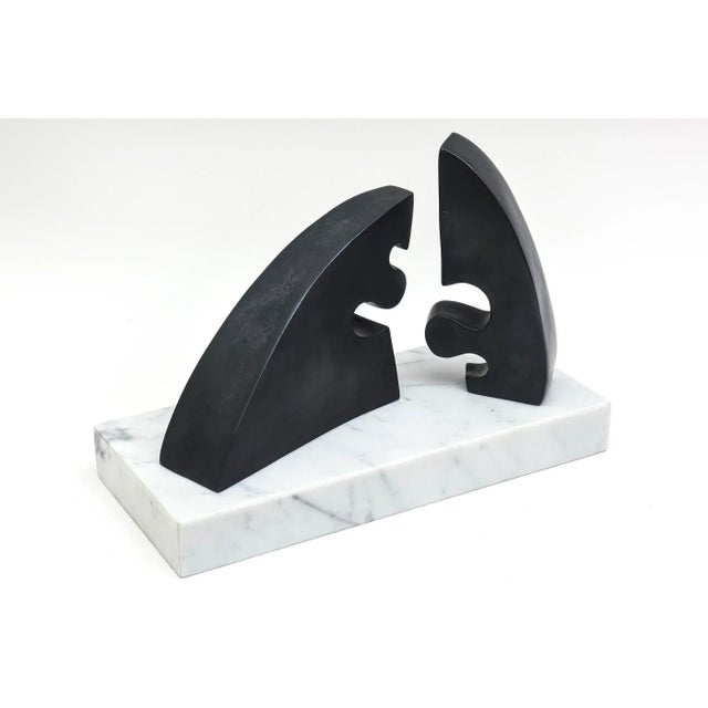 This fabulous signed vintage bronze sculpture has 2 abstract figures facing each other almost in a pretend dialogue or...