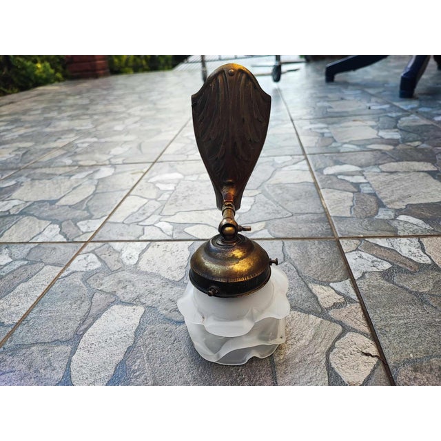 Art deco, brass wall lamp, dimensions: height 21 cm, depth 15 cm, width 7 cm. shade diameter 8.5 cm. European Plug (up to...