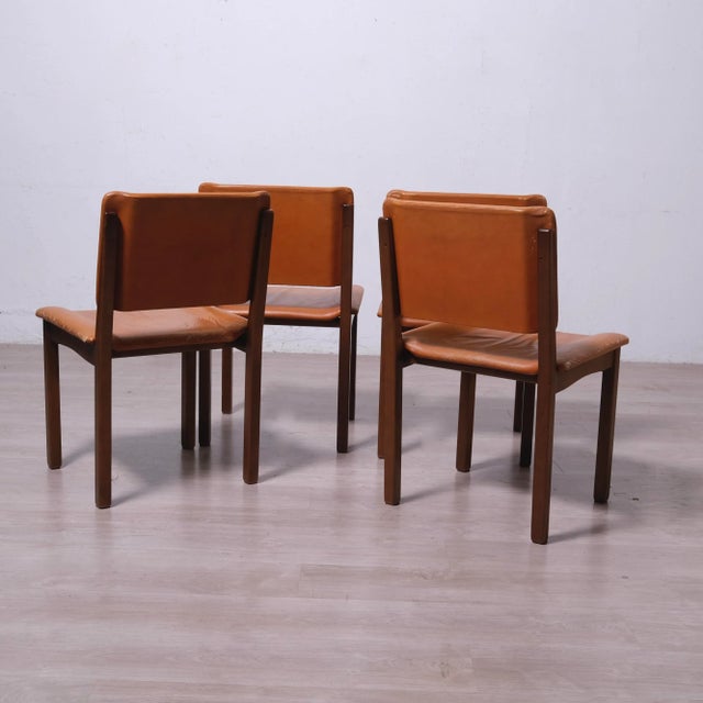Beautiful set of four 1970s chairs, produced in the Sormani style. Wooden frame, brown leather seat and backrest. Height:...