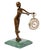 This Art Nouveau pocket watch stand in patinated bronze depicts a young, veiled nude woman with supple, restrained lines....