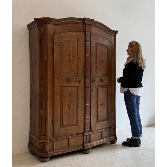 A 19th-century German Bodensee (Lake Constance) cabinet or wedding cabinet, dated 1832. Crafted from solid oak with inlays...