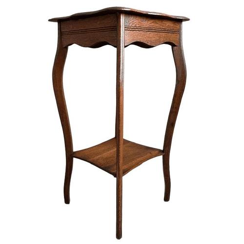 Beautiful, elegant, tall vintage Art Nouveau plant table made of solid oak from the 1920s. This Art Nouveau coffee table,...