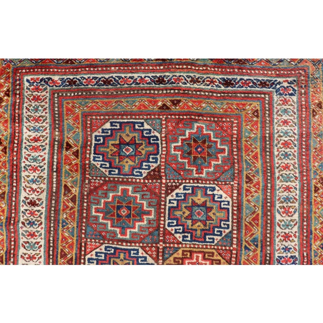 Late 19th Century Antique Caucasian Kazak Rug With Red Field and Star Medallion Design For Sale - Image 5 of 12
