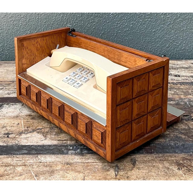 Exuding nostalgic charm and refined mid-century functionality, this retro wooden telephone box features a low-profile...