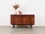 The cabinet was made in the 1970s in Denmark. The structure is covered with rosewood veneer. The legs are made of solid...