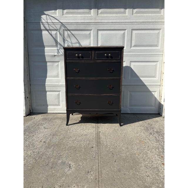 We have a beautiful, vintage distressed dresser for sale. It has been refinished using “Onyx” paint by Benjamin Moore, and...
