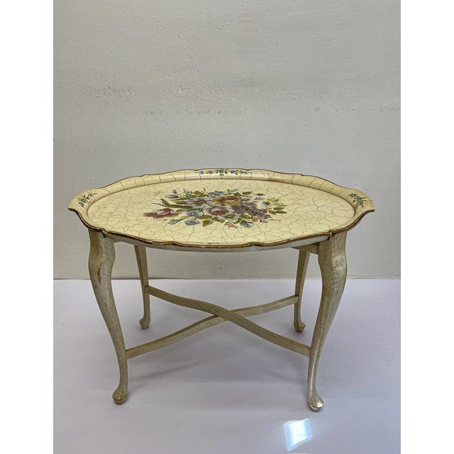 A painted wood serving tray on a matching stand, 1st half 20th century, marked Wiggers Denmark. Very nice and decorative,...