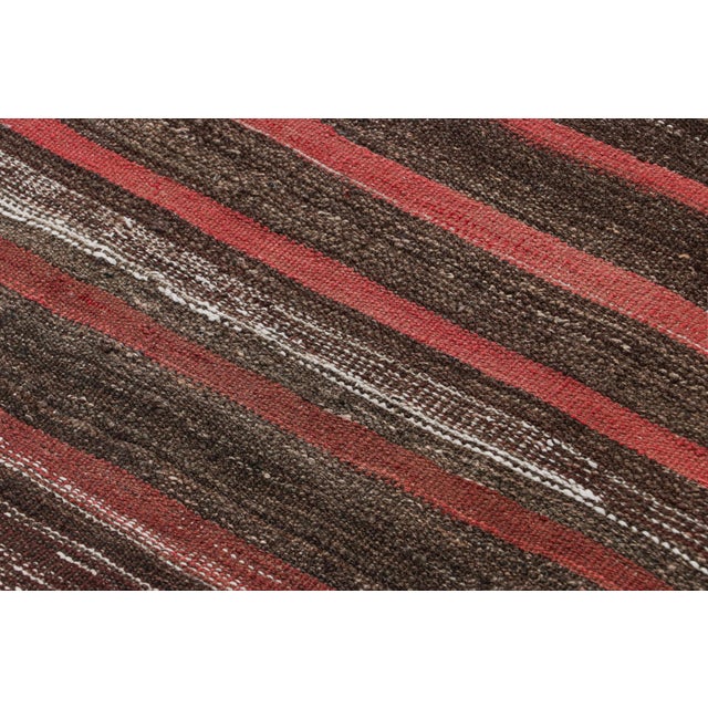 Made with handwoven wool in Persia circa 1950-1960, this 4x6 vintage Shahsavan Kilim is a particularly bright and sought-...