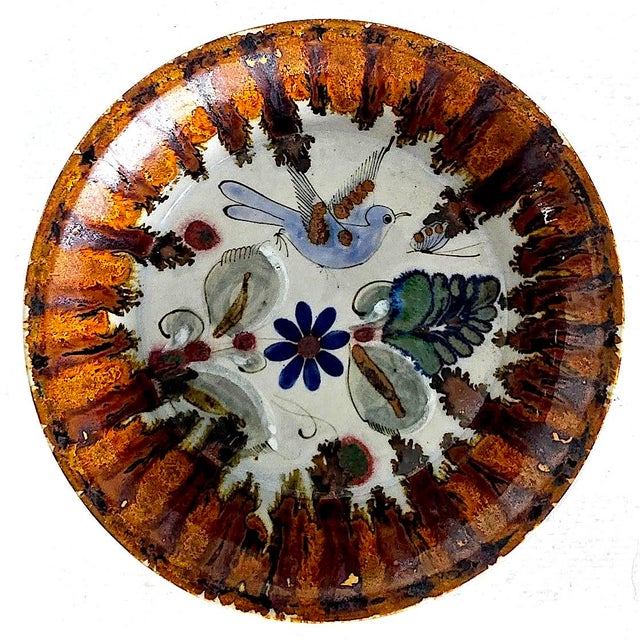 Offered is a vintage 1970s burnished ceramic pedestal bowl from Tonalá in Jalisco, Mexico and created by Ken Edwards...