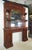 Antique Victorian monumental fireplace mantel made of mahogany in a dark stain with an upper and lower section. The upper...