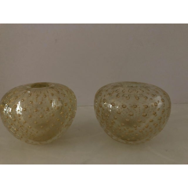 Great pair of gold fleck Murano candle holders/ vases. Circa 1960’s Made in Italy. Pristine condition . Each measures 4”...