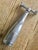 A beautiful pewter corkscrew in the shape of a wine barrel. Nice detail on the handle with grape and grapevine motif....
