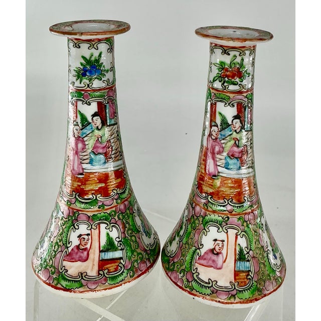 Pair of antique trumpet form porcelain Rose MedAllion hand painted candlesticks.