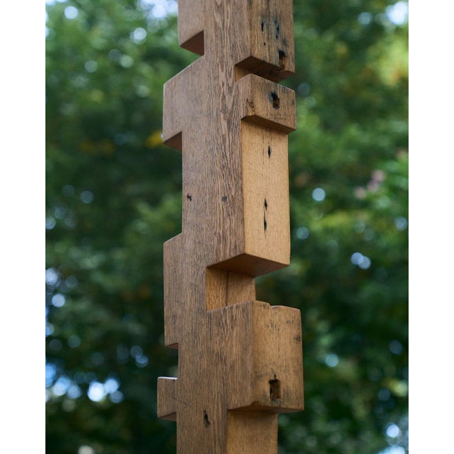 made from a single white oak beam natural oil and wax finish pictured on cement composite base intended for indoor use...