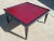 1950’s Black cerused finish frame and burgundy colored top coffee table designed by Paul Frankl for Brown Saltman.
