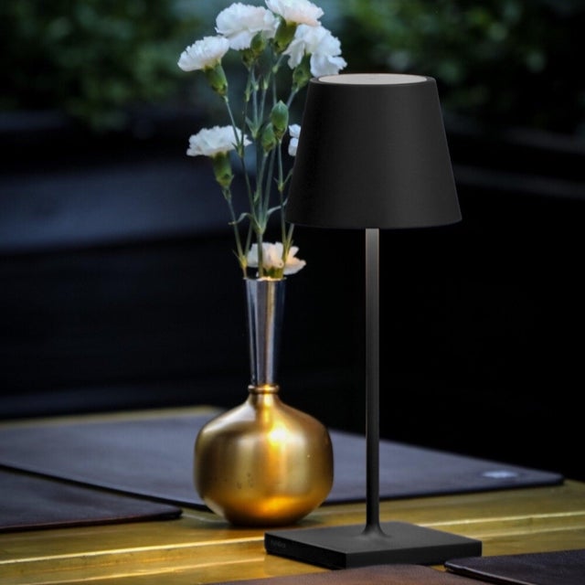 Battery-operated and rechargeable portable table lamp. The lamp features dimming touch control and has 3-CCT color...