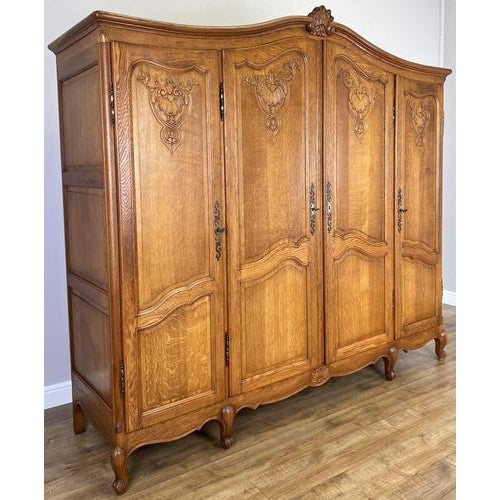 This beautiful Vintage French Louis wardrobe showcases elegant craftsmanship and classic French styling, making it a...