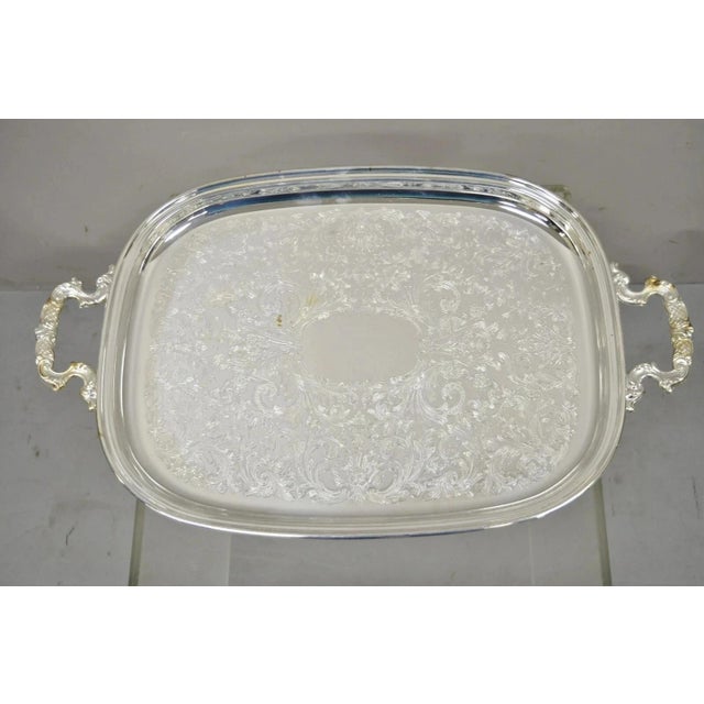 Vintage Eales Silver Plated 22" Footed Twin Handle Bar Tray Platter. Item features leafy scroll engravings, ornate twin...