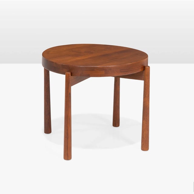 Vintage flip top table in teak by Jens Quistgaard. This neat little side table is in good vintage condition and features a...